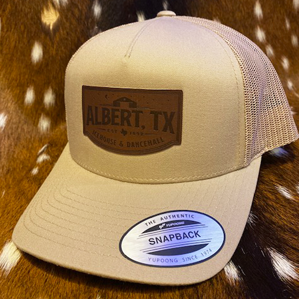 YUPOONG ALBERT LEATHER PATCH TRUCKER HAT - TAN